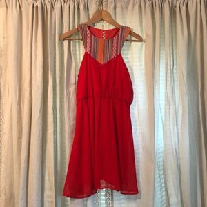 Tangerine tribal print dress.